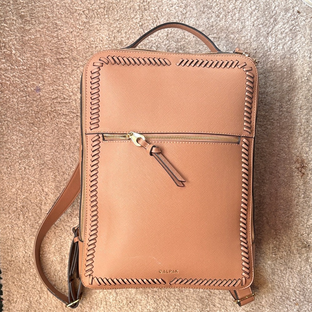 Super oferta today .Calpak Tan Leather Backpack
